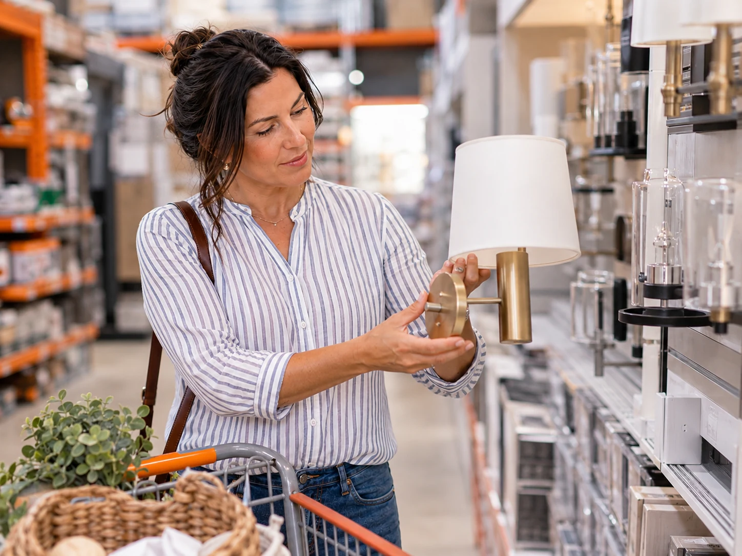 Faye shopping in a home improvement store while comparing a stylish, affordable home-upgrade product that looks more expensive than it is